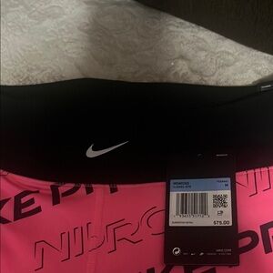 Nike Women's Black and Pink Leggings
